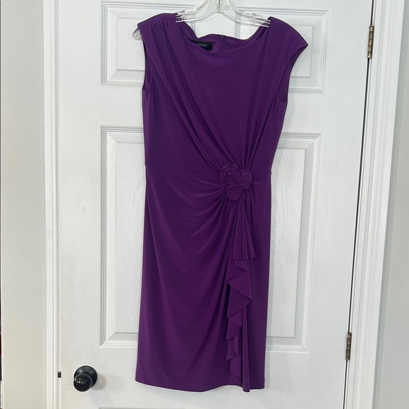 Jones & Co. Dresses & Skirts - Jones & Co Sleeveless Purple Midi Dress with Rosette Accent